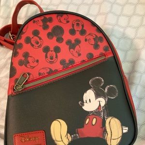 Mickey Mouse mini backpack. Purchased last summer and used it once.